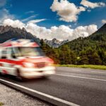 Ambulance van rushes down the highway