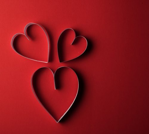 Red Hearth paper on Red background